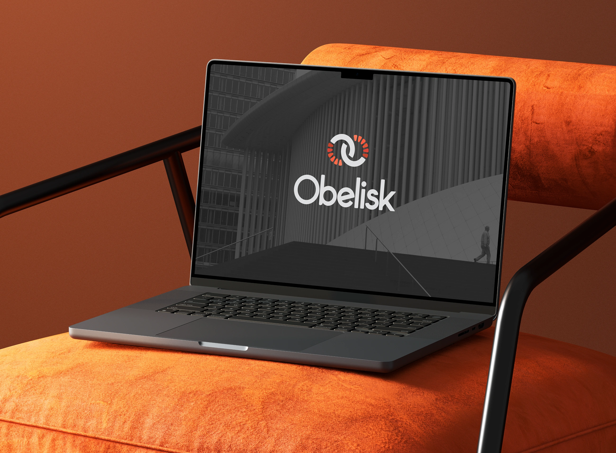 Obelisk brand mark on a laptop screen