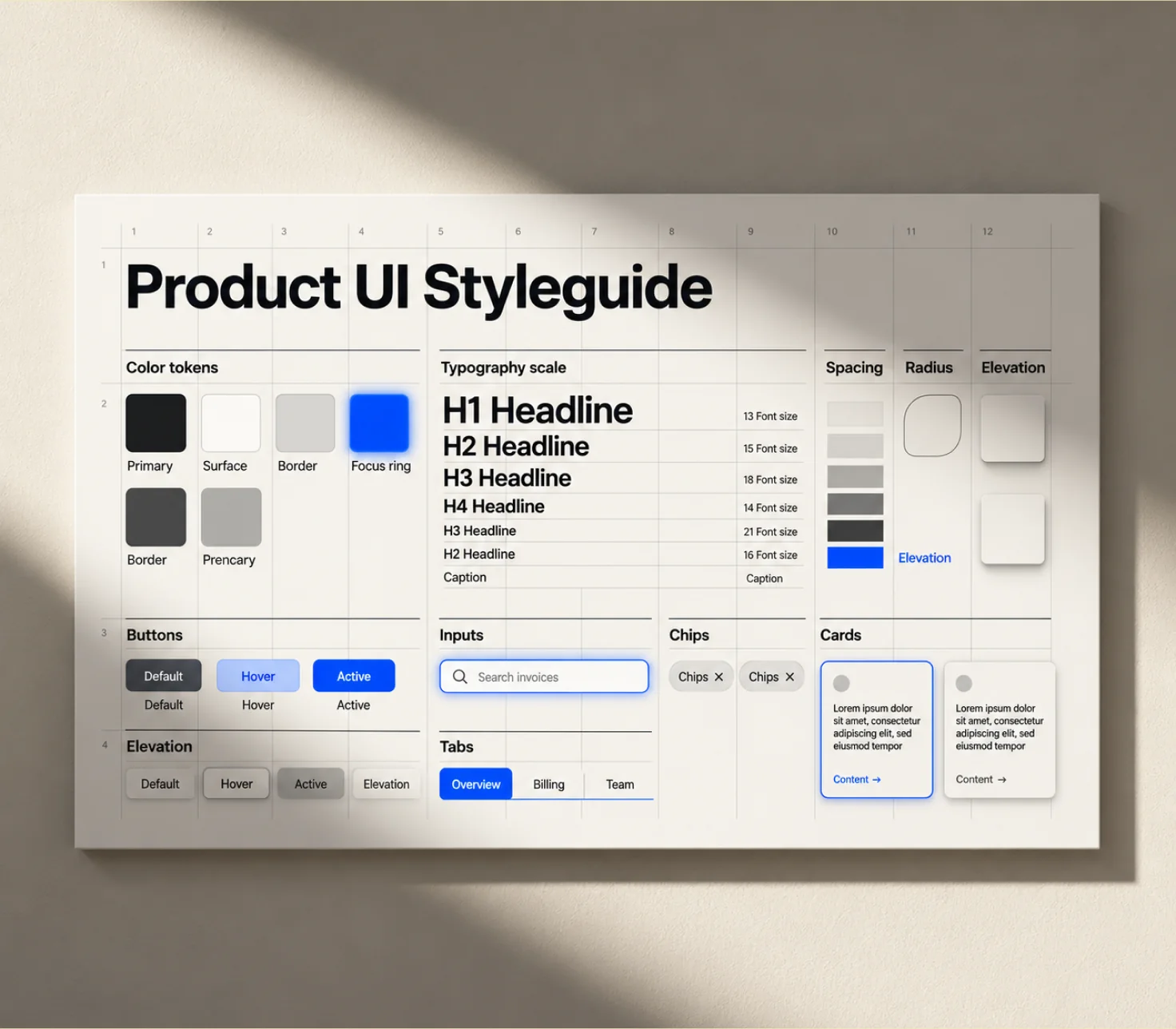 A product UI styleguide printed and pinned to a wall