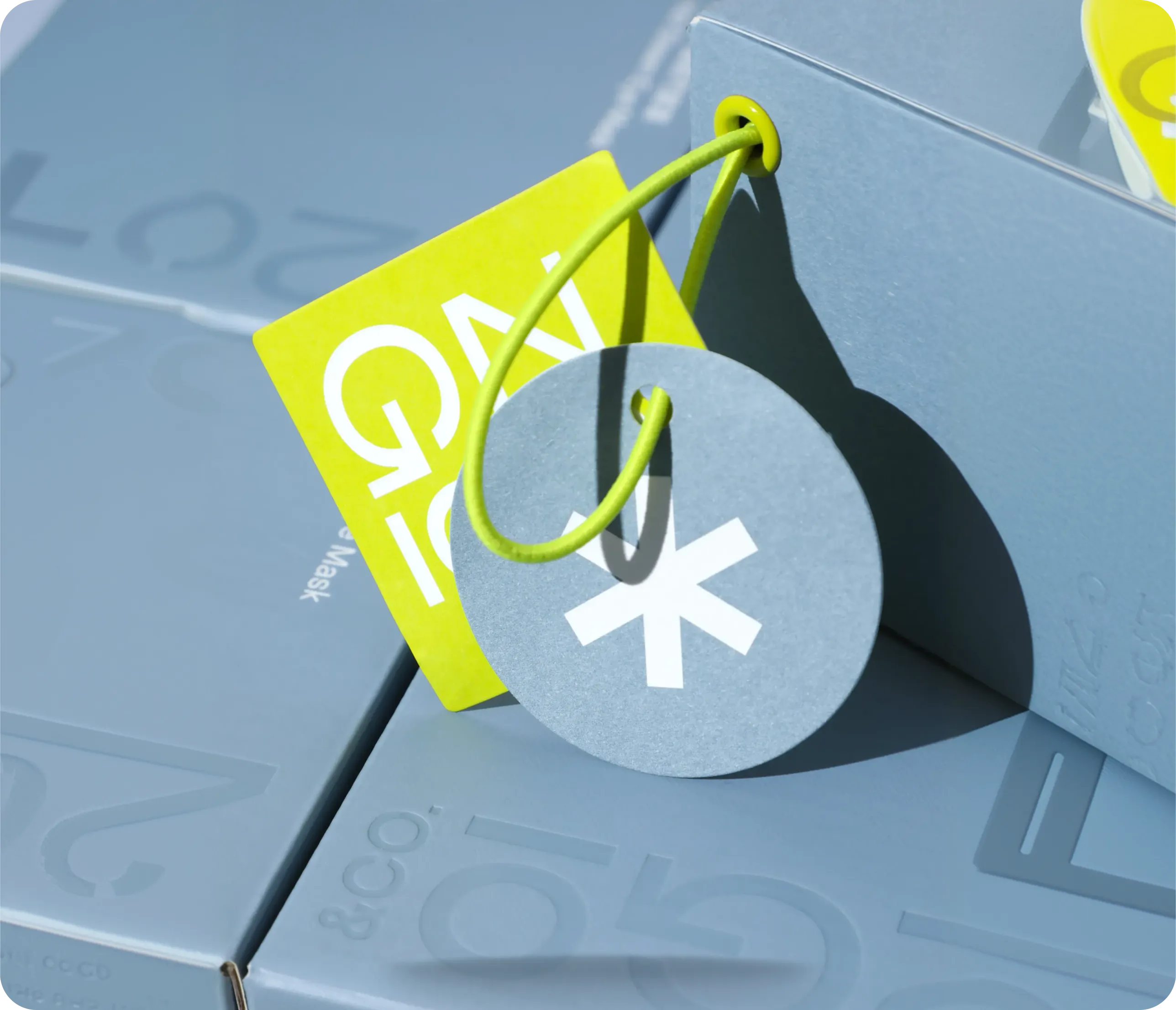 Branded swing tag on blue packaging